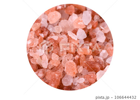 Pink and white large Himalayan salt in a white saucer Pink and white large Himalayan salt in a white saucer 106644432