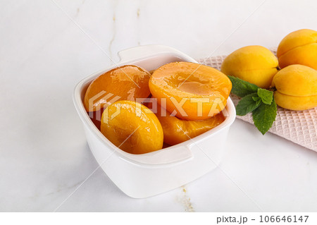 Few canned aprocots in the bowl Few canned aprocots in the bowl 106646147