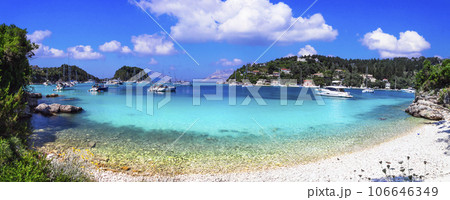 Beautiful small ionian greek island Paxos. view of wonderful scenic beach and bay Lakka with sailng boats. Greece travel 106646349