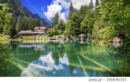amazing Swiss ountain lakes - beautiful fairytale Blausee lake with clear trasparen waters. near Kandersteg village. Switzerland travel and scenery amazing Swiss ountain lakes - beautiful fairytale Blausee lake with clear trasparen waters. near Kandersteg village. Switzerland travel and scenery 106646385