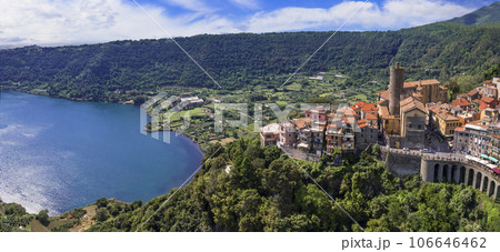 Most scenic lakes of Italy - volcanic Lago di Nemi , aerial drone view of Nemi village and volcano crater. popular touristic site near Rome Most scenic lakes of Italy - volcanic Lago di Nemi , aerial drone view of Nemi village and volcano crater. popular touristic site near Rome 106646462