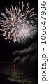 Fireworks burst on the seaside. Black and white colour. Night festival celebration 106647936