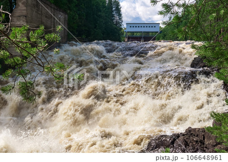 waterfall during opened locks for idle discharge of water at a small hydroelectric power station 106648961
