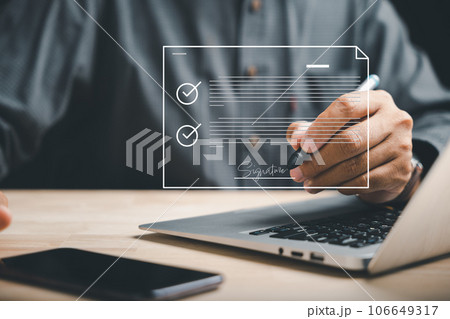 Businessman embraces digital transformation, signing business contract online. Illustrates e-signing, digital document management, and paperless office concept. Agreement is sealed. 106649317