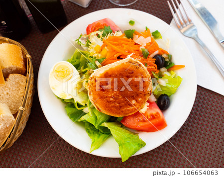 Goat cheese salad with vegetables Goat cheese salad with vegetables 106654063