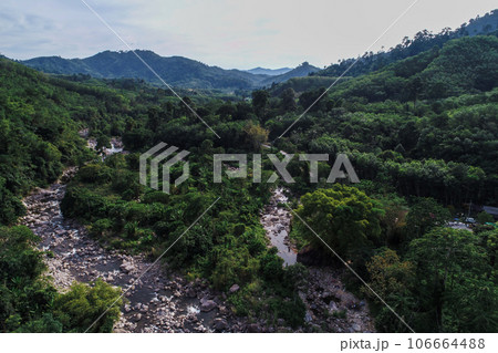 Beautiful waterfall in deep tropical rain forest nature landscape Beautiful waterfall in deep tropical rain forest nature landscape 106664488