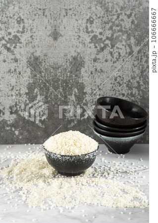 Rice in a bowl, illuminated by sunlight. Rice in a bowl, illuminated by sunlight. 106666667