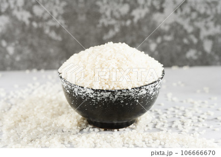 Rice in a bowl, illuminated by sunlight. Rice in a bowl, illuminated by sunlight. 106666670