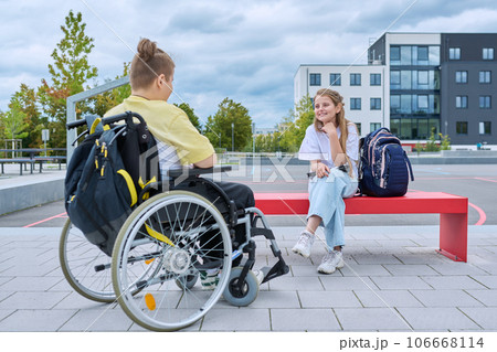 Friendship communication of children of boy in wheelchair and girl 106668114
