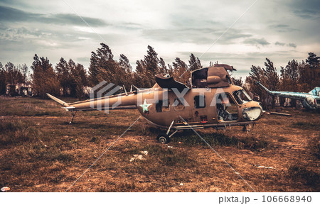 Abandoned helicopter at the airfield Abandoned helicopter at the airfield 106668940