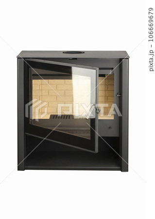Modern fireplaces for heating from metal and heat-resistant glass. Boiler for solid fuel isolated on white background. Modern fireplaces for heating from metal and heat-resistant glass. Boiler for solid fuel isolated on white background. 106669679