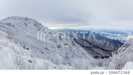 Snow-capped Deogyusan mountains on a clear day in winter, South Korea. Snow-capped Deogyusan mountains on a clear day in winter, South Korea. 106672368