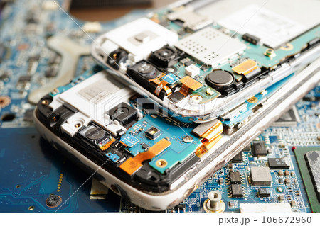 Repairing and upgrade mobile phone, electronic, computer hardware and technology concept. Repairing and upgrade mobile phone, electronic, computer hardware and technology concept. 106672960