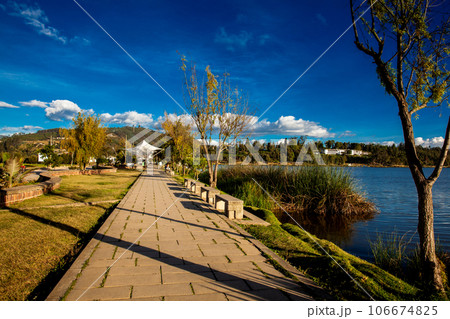 Path of the Sochagota artificial lake built in 1956 to provide tourism potential for the municipality of Paipa, in the department of Boyaca, northeastern Colombia. 106674825