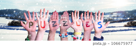 Children Hands Building Word Puzzles, Winter Background 106675977