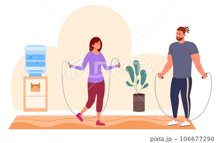 Woman jumping with skipping rope in gym interior 106677290