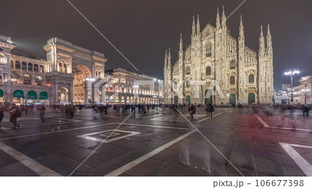 Panorama showing Milan Cathedral and Vittorio Emanuele gallery night timelapse. 106677398