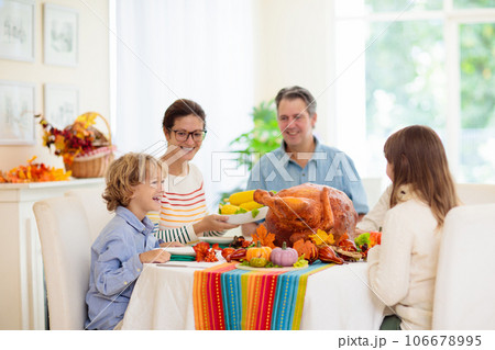 Thanksgiving family dinner. Roasted turkey meal. 106678995