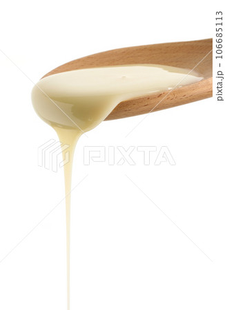 pouring condensed milk pouring condensed milk 106685113