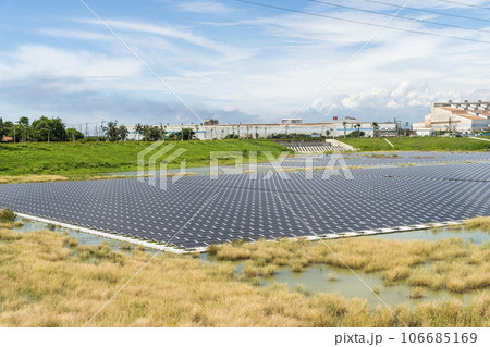 View of the floating Solar power system on the flood detention basin in Kaohsiung, Taiwan. View of the floating Solar power system on the flood detention basin in Kaohsiung, Taiwan. 106685169