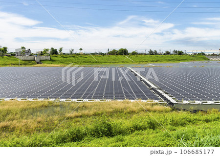 View of the floating Solar power system on the flood detention basin in Kaohsiung, Taiwan. View of the floating Solar power system on the flood detention basin in Kaohsiung, Taiwan. 106685177