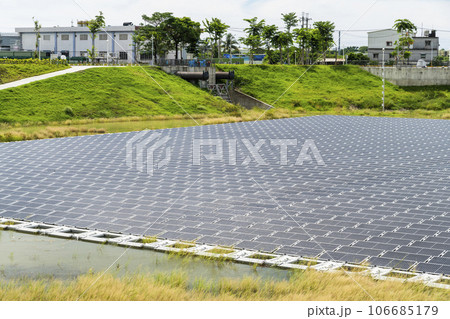 View of the floating Solar power system on the flood detention basin in Kaohsiung, Taiwan. View of the floating Solar power system on the flood detention basin in Kaohsiung, Taiwan. 106685179