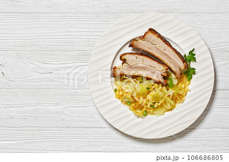 Haluski, fried cabbage, noodles with roast ribs 106686805