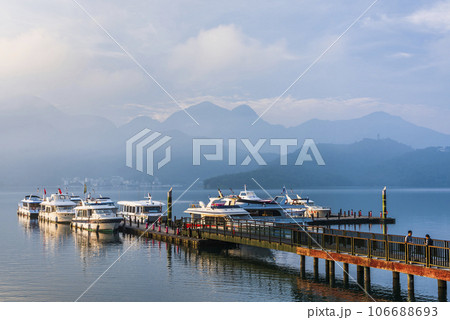 The scenery of the Yacht Marina at Sun Moon Lake in the morning is a famous attraction in Nantou, Taiwan. The scenery of the Yacht Marina at Sun Moon Lake in the morning is a famous attraction in Nantou, Taiwan. 106688693