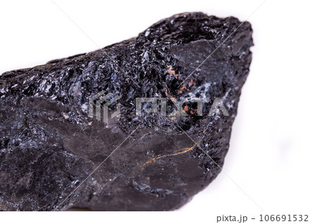 Macro mineral stone sorrel - black tourmaline on white background 106691532