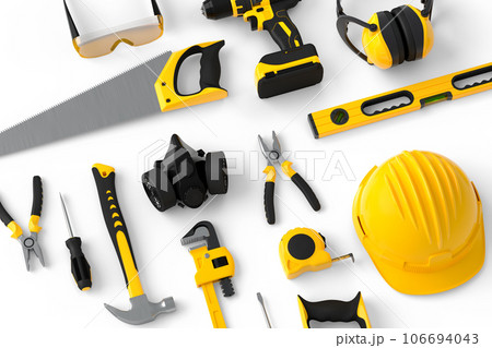 Flying view of yellow construction tools for repair on white background Flying view of yellow construction tools for repair on white background 106694043