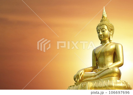 Magha Asanha Visakha Puja Day , Silhouette Buddha on golden sunset background. 106697696