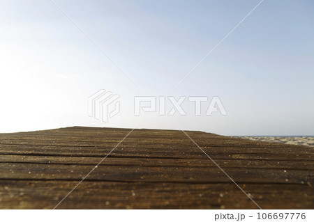 Wooden boardwalk on beach Wooden boardwalk on beach 106697776