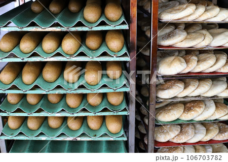 bread and bakery products are sold in a store in Israel. bread and bakery products are sold in a store in Israel. 106703782