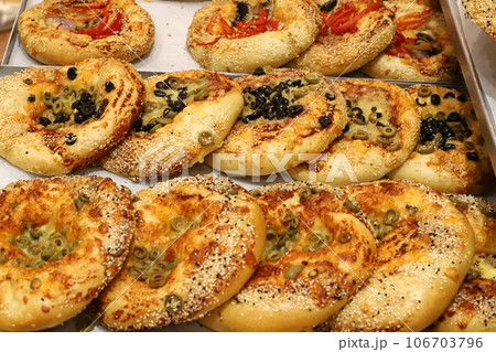 bread and bakery products are sold in a store in Israel. bread and bakery products are sold in a store in Israel. 106703796