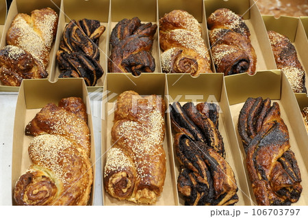bread and bakery products are sold in a store in Israel. bread and bakery products are sold in a store in Israel. 106703797