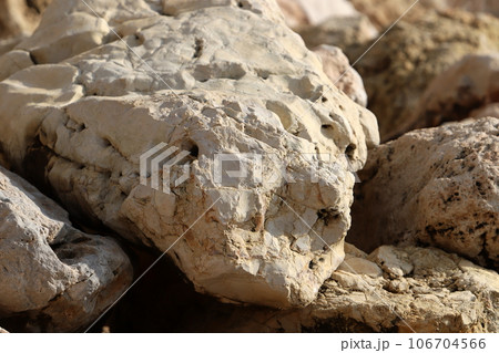 Texture of stones and mountain rocks in a city park in Israel. 106704566