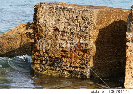 Texture of stones and mountain rocks in a city park in Israel. 106704572
