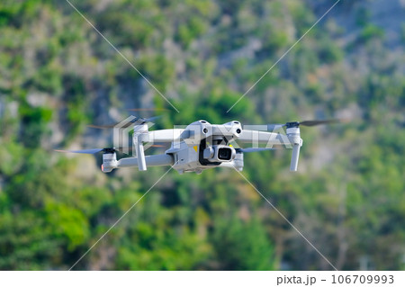 Aerial equipment Drone with Digital Camera on the mountain background.Technology concept Aerial equipment Drone with Digital Camera on the mountain background.Technology concept 106709993