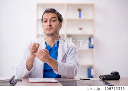Young male doctor in vaccination concept Young male doctor in vaccination concept 106713556