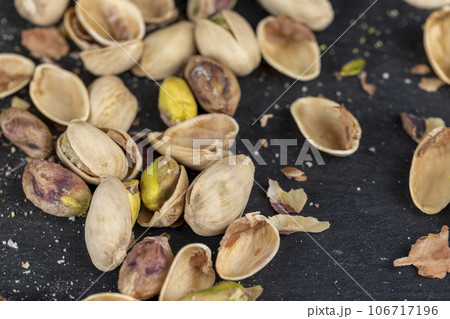 a large number of salty and crispy pistachios close-up a large number of salty and crispy pistachios close-up 106717196
