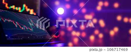 graph hologram on table with computer background. Concept of financial markets. graph hologram on table with computer background. Concept of financial markets. 106717469