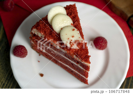 Red cake with cream and raspberry flavor Red cake with cream and raspberry flavor 106717848