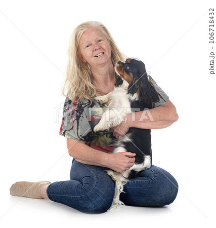 cavalier king charles and woman 106718432