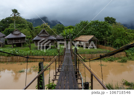 Village and mountain in Vang Vieng, Laos, Nam Song River in Vang Vieng, Laos. 106718546