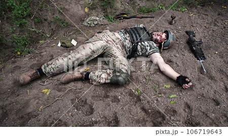 Wounded soldier lie on the battlefield Wounded soldier lie on the battlefield 106719643