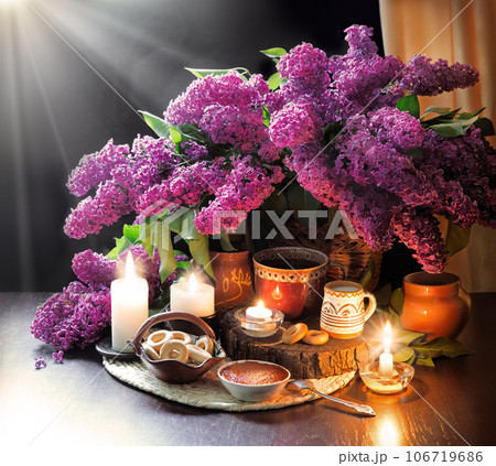 Still life from food and lush lilac boquet Still life from food and lush lilac boquet 106719686
