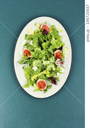 Salad with figs, herbs and cheese. 106720887