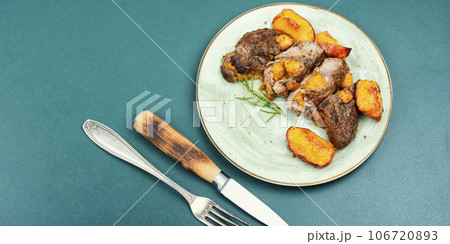 Juicy meat steak with peach. Juicy meat steak with peach. 106720893