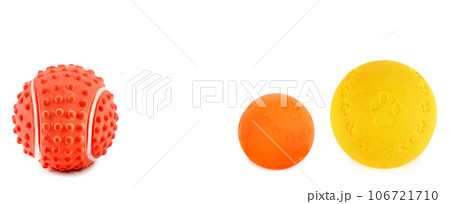 Bright dog balls isolated on white background. Wide photo. Free space for text. Collage. Bright dog balls isolated on white background. Wide photo. Free space for text. Collage. 106721710