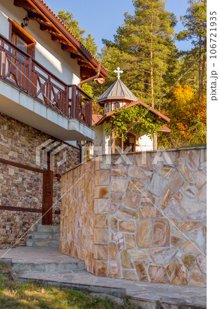 Autumn landscape with chapel and house, Bulgaria 106721935